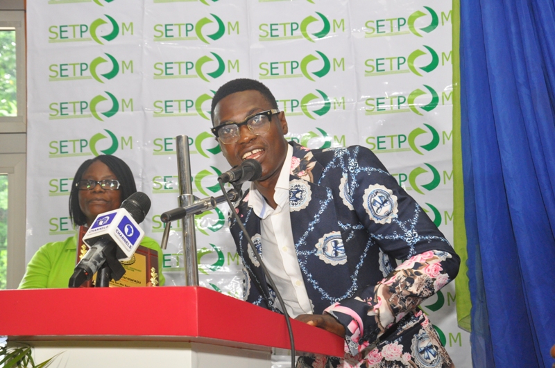 An award recipient speaking at the E-Squad launch